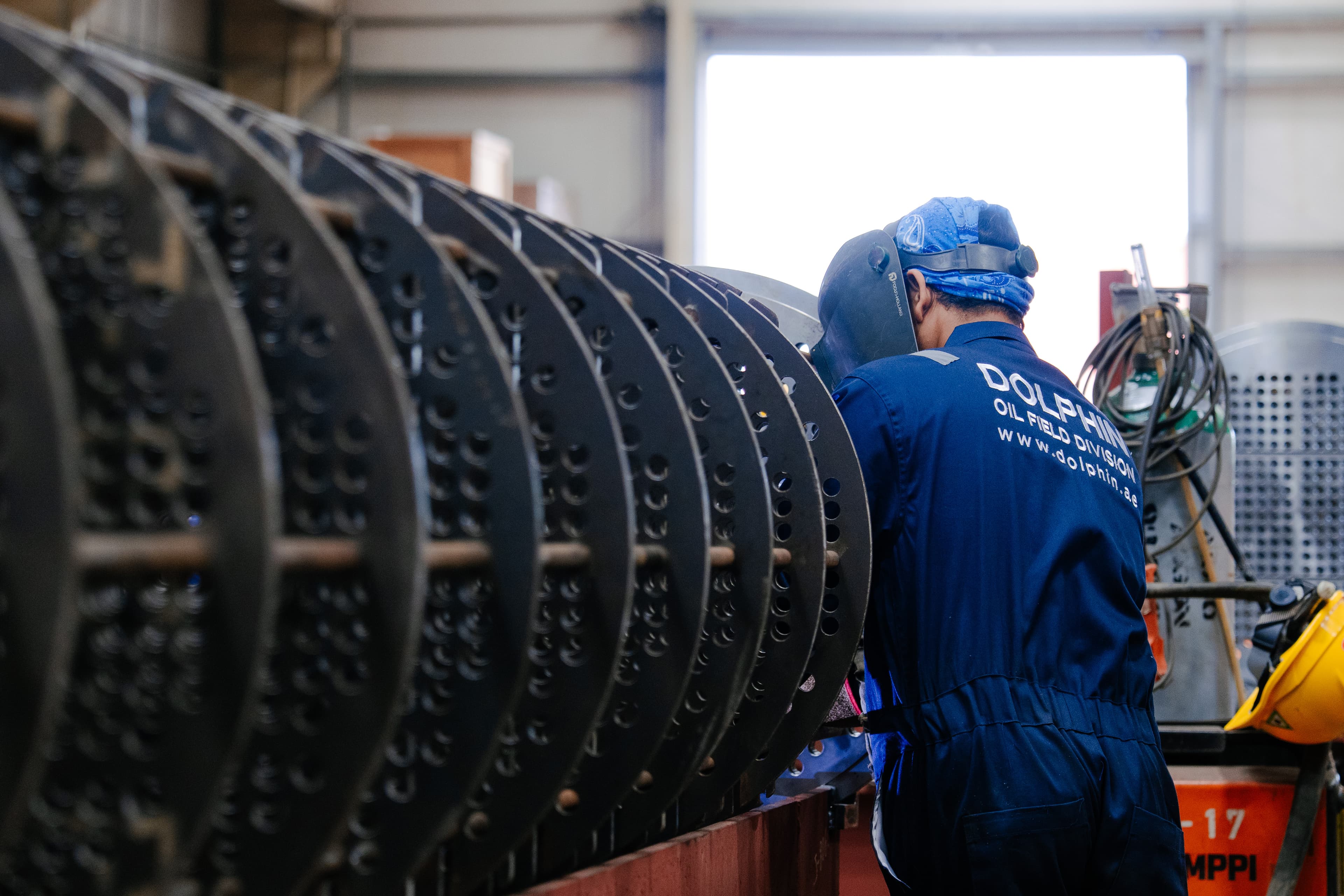 Dolphin technicians assembling a plate heat exchanger pack