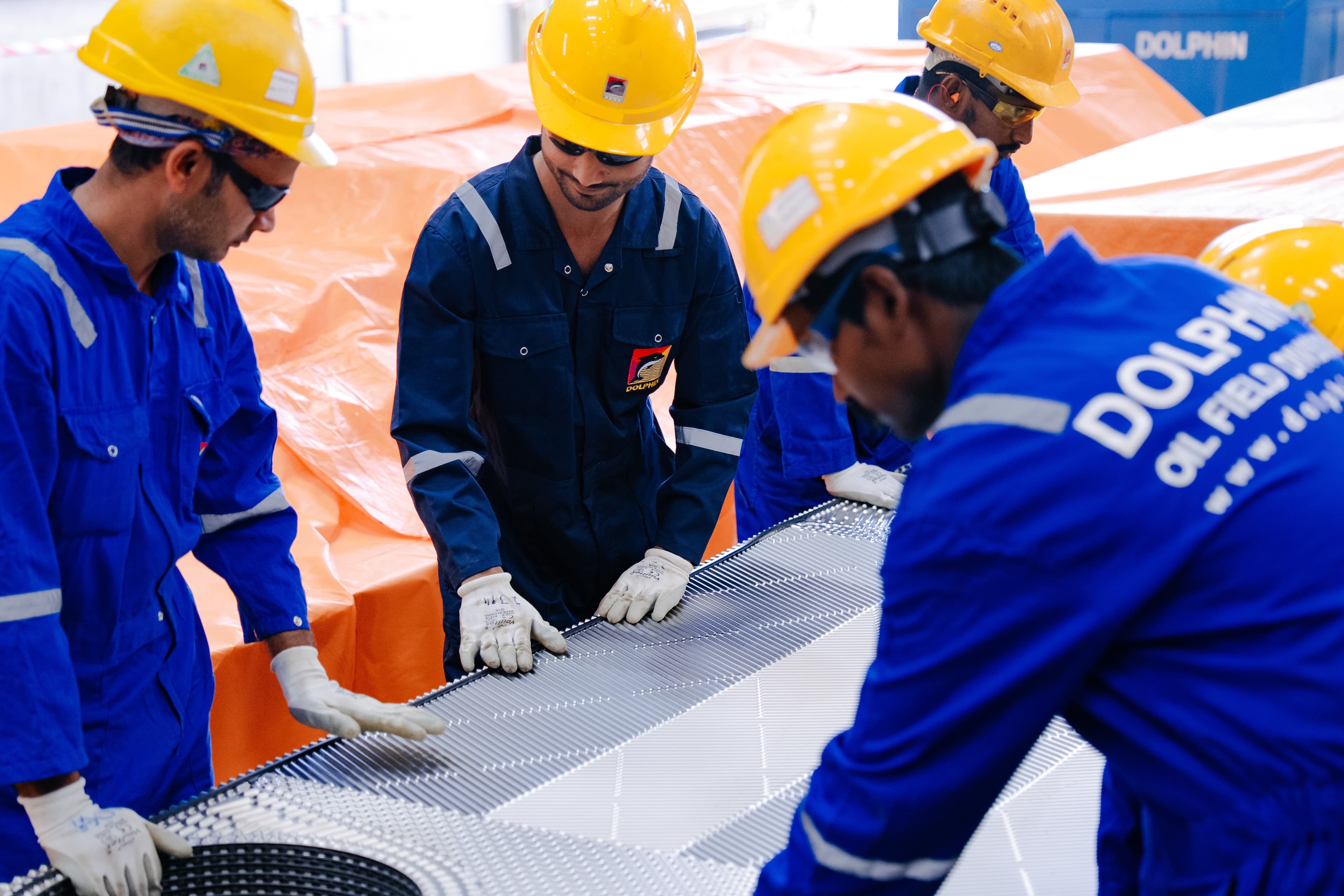 Dolphin Group technicians assembling a plate heat exchanger